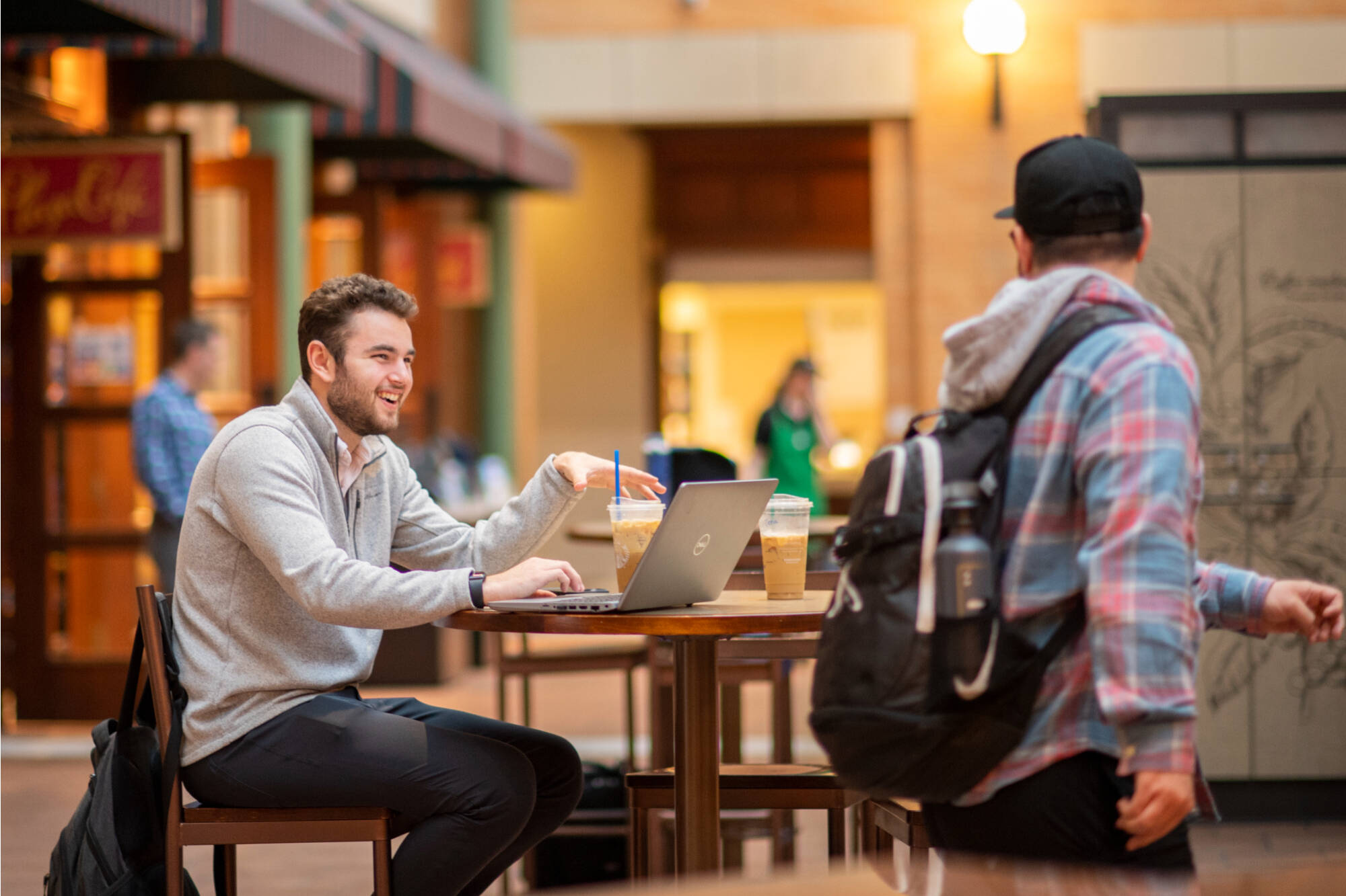 Students interacting in the DeVos dining area